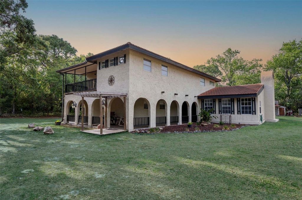 Photo of 12311 Oakwood Drive, Hudson, FL 34669 (MLS # TB8384501)