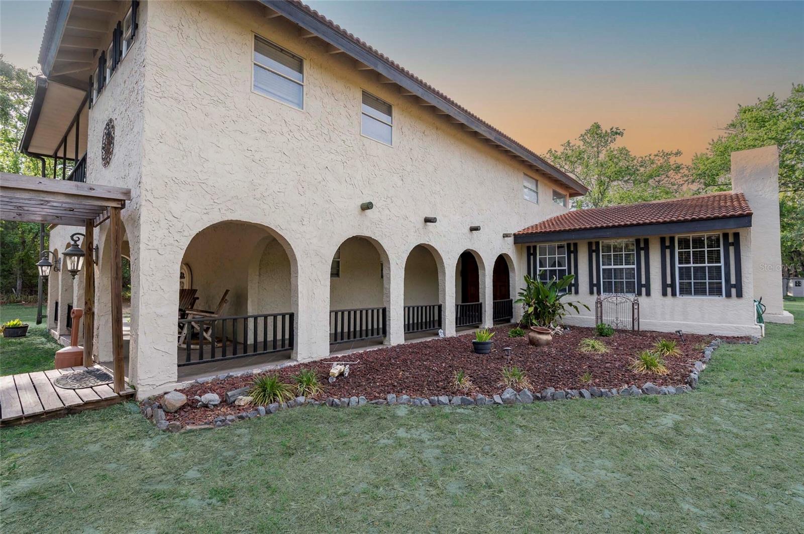 Set on two peaceful acres in the heart of Hudson, this 5-bedroom Spanish-style home offers the perfect blend of comfort, character, and wide-open country living. Positioned right in the center of the property, the home is surrounded by open space, mature trees, and beautiful views in every direction — giving you privacy, room to breathe, and a true sense of home. Tucked away for added privacy, the home also features a mother-in-law suite with it's own entrance allowing a very comfortable private living.
Inside, the home features five spacious bedrooms, a warm and welcoming layout, and charming Spanish-style details that add a sense of timeless appeal. Whether you’re hosting friends or enjoying quiet evenings with family, this home is designed for everyday living with a relaxed, down-to-earth feel.
Step outside and you’ll find the kind of space that makes country living truly special. Cool off in your private in-ground pool on warm Florida days, or simply relax and enjoy the peace and quiet that surrounds you. The property also features a well-kept barn, ready for horses, animals, or your next big project. With zoning that allows up to 6 horses, this land gives you the freedom to live the way you’ve always wanted — whether that’s riding at sunrise, starting a small hobby farm, or just enjoying the beauty of wide-open space.
Whether you’re starting a homestead, growing your family, or just ready for a quieter pace, this home has the land, layout, and potential to grow with you. Located just a short drive from local shops, schools, and everyday essentials, this property offers the best of both worlds — peaceful country living with convenience close by. Come see what makes this place special — and imagine the lifestyle waiting for you here.
A rare find with this much land and potential in Hudson — schedule your showing today!