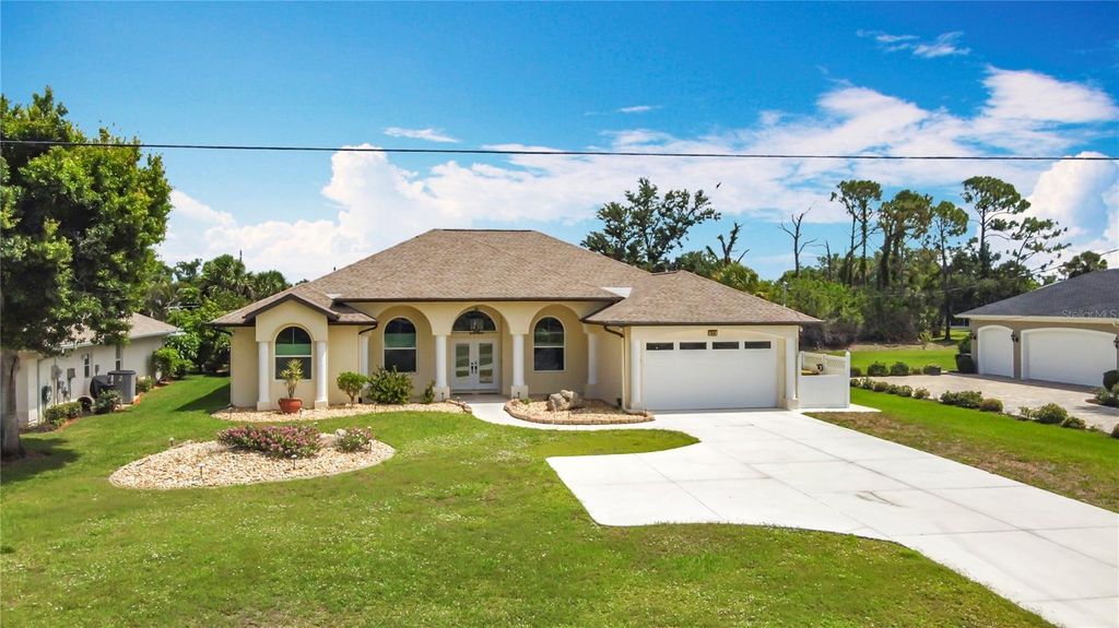 Photo of 613 Boundary Boulevard, Rotonda West, FL 33947 (MLS # D6144314)