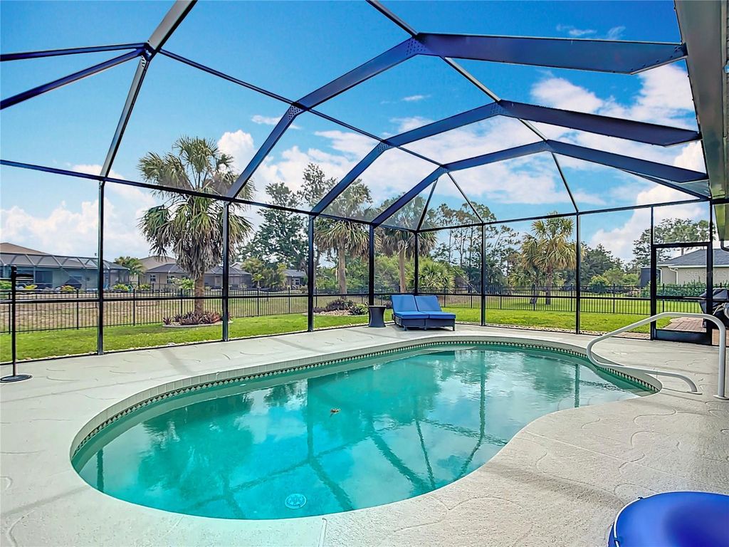 Photo of 613 Boundary Boulevard, Rotonda West, FL 33947 (MLS # D6144314)