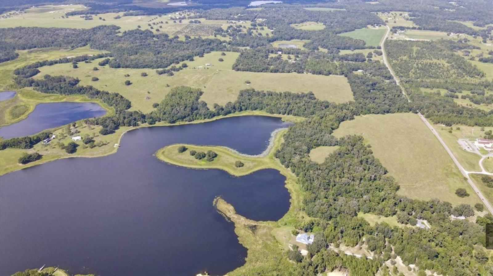 9.96 Acres with frontage on Lake St Clair (100 acres) - Rolling hill with improved pasture - Some of the highest elevations in the state - Paved road - Zoning is Agricultural - Rich soil and lush pasture - Excellent grazing land - Located in Hernando County 1 mile North of the Pasco County Line - EZ onto I-75 - 30 Minutes North of Tampa - 40 Minutes North of Tampa International Airport - Approximately 1 hour to St Petersburg - Conveniently located between Brooksville and approximately 6 miles from Dade City - Additional lots available
