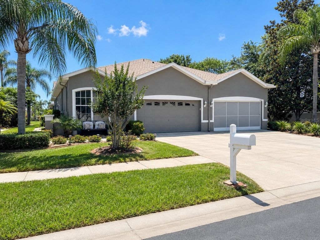 Photo of 11455 Golf Round Drive, New Port Richey, FL 34654 (MLS # TB8511874)
