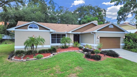 Photo of 611 Tomoka Drive, Palm Harbor, FL 34683 (MLS # W7889518)