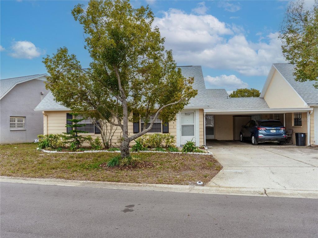 Photo of 6652 Dartmoor Lane #5A, New Port Richey, FL 34653 (MLS # W7883404)