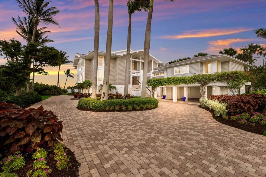 Welcome to one of Boca Bay’s most extraordinary residences—an architecturally stunning home in the exclusive, gated enclave of Grande Bay. Designed by acclaimed Sarasota firm, Seibert Architects, to capture the expansive views of Charlotte Harbor and the natural environment, it is perfectly positioned on the neighborhood’s most private homesite - the only site without a neighboring home to the North, being directly bordered by Boca Bay preservation land.
Spanning 4,982 square feet, this one-of-a-kind residence is a masterclass in light, space, and elegance. Towering ceiling volumes on the main level create a grand, airy ambiance, while floor-to-ceiling windows along the entire North side frame uninterrupted vistas of Charlotte Harbor and Boca Grande’s bayside coastline. Internal spaces are organized around the central volume flowing freely from area to area.  Nearly every room enjoys a water view, and the top living level offers a rare, sweeping panorama that stretches from the radiant sunrises of Charlotte Harbor to breathtaking sunsets over the Gulf to the west. French doors along the waterfront façade blur the boundary between indoors and out, drawing in the beauty of the harbor at every turn.
A private deep-water dock extends into the harbor, offering an exceptional vantage point to take in wide-open bay views and direct access to boating, fishing, and waterborne adventures right from your backyard.
The reimagined chef’s kitchen is both functional and sophisticated, outfitted with Sub-Zero refrigeration, Wolf double ovens, a Viking induction cooktop, and a custom-designed coffee bar, all set against bespoke cabinetry and refined finishes.
Every detail reflects craftsmanship and intention: level 5 smooth-finish walls, impact-rated windows and doors, a Control4 whole-home automation system with integrated LED scene lighting, a private elevator servicing all three levels, and hurricane-rated roll-down Magnatrack screens. A powerful whole home Kohler generator ensures uninterrupted comfort and security.
As part of Boca Bay, residents enjoy access to resort-style amenities including four pools, the newly renovated Pass Club, a private beach club, a bayside fishing pier, a fitness center, Har-Tru tennis courts, pickleball courts, and a vibrant social calendar.  
Impeccably maintained and thoughtfully updated throughout, this exceptional Grande Bay estate is a rare offering—an exquisite blend of privacy, design, and waterfront splendor in one of Boca Grande’s most coveted communities.