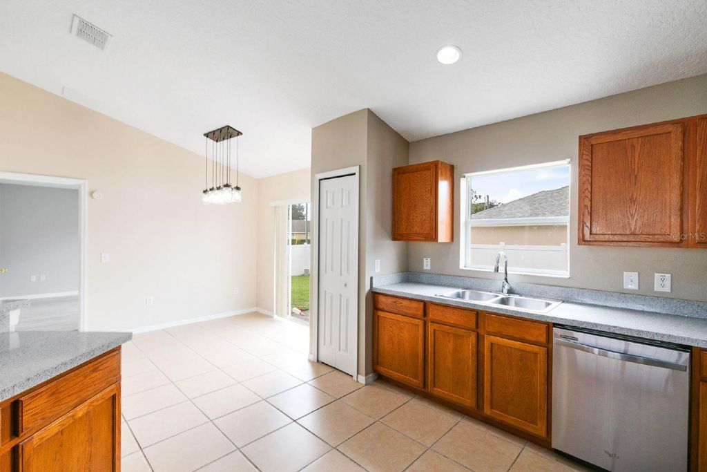 Photo of 12 Sawfish Lane, Kissimmee, FL 34759 (MLS # O6379414)