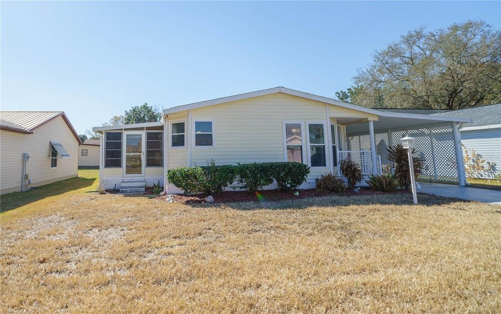 Photo of 1228 Maria Court, Lady Lake, FL 32159 (MLS # OM719395)