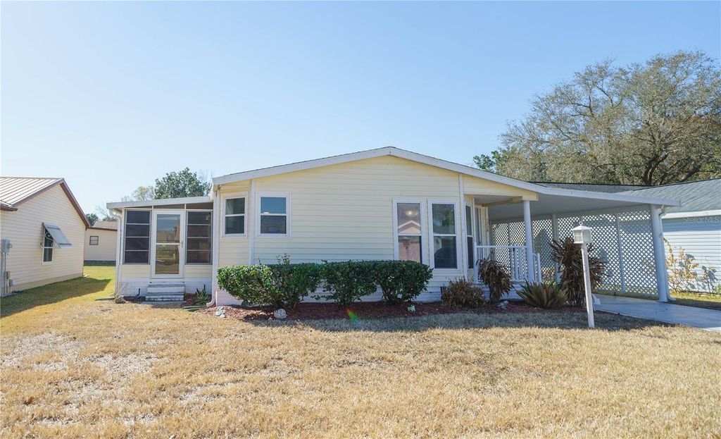 Photo of 1228 Maria Court, Lady Lake, FL 32159 (MLS # OM719395)