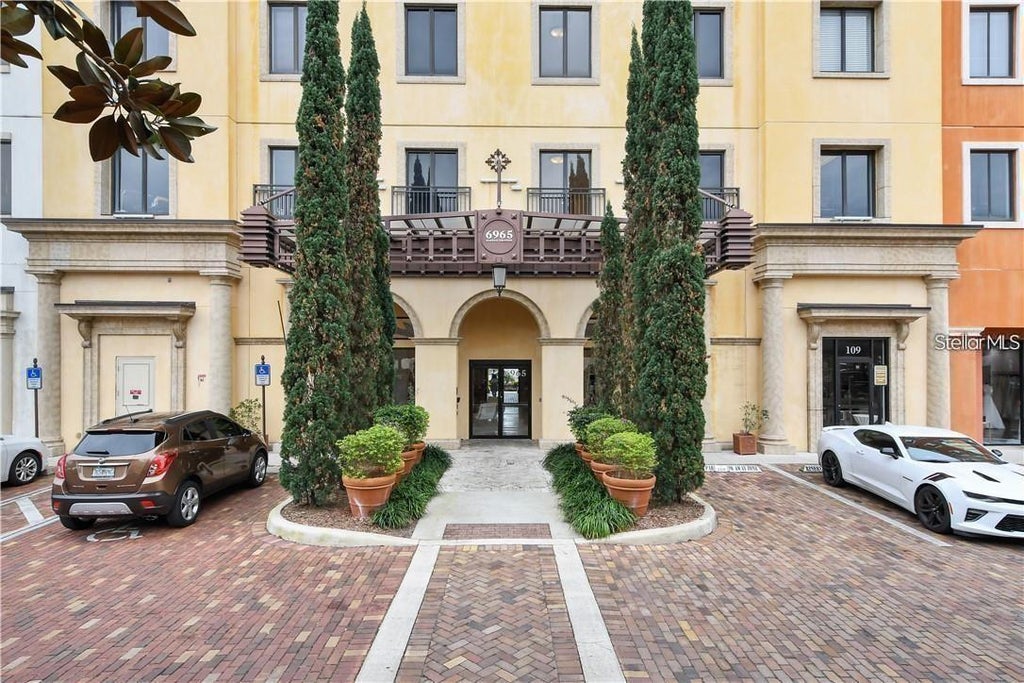 Photo of 6965 Piazza Grande Avenue #210-6, Orlando, FL 32835 (MLS # O6452232)