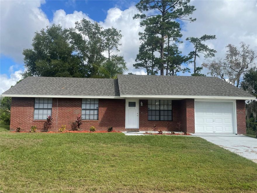 This charming brick home is truly move-in ready and features a new roof installed in August 2024. Recent updates include new carpeting, a new water heater, and new interior doors, offering both comfort and peace of mind to the next owner. Situated on a corner lot in a quiet neighborhood, the property is within walking distance of a scenic lakeside community park with a playground and picnic area. Enjoy no HOA fees and a convenient location close to local supermarkets, restaurants, universities, hospital, and shopping. Historic Downtown DeLand’s dining, entertainment, and cultural attractions are just minutes away, with easy access to FL-44, Interstate 4 to Orlando, and International Speedway to Daytona Beach. This home is ideal for a small family or anyone seeking a well-maintained residence in a desirable location. Don’t miss this opportunity—schedule your private showing today.