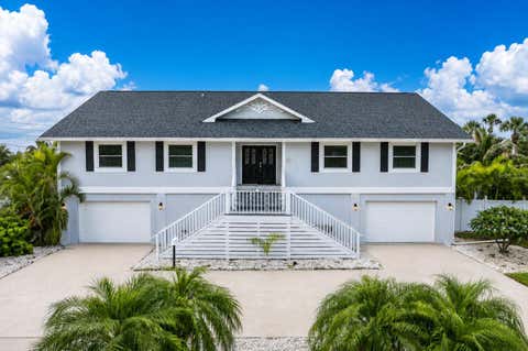 Photo of 6501 Mockingbird Way S, Gulfport, FL 33707 (MLS # TB8539199)