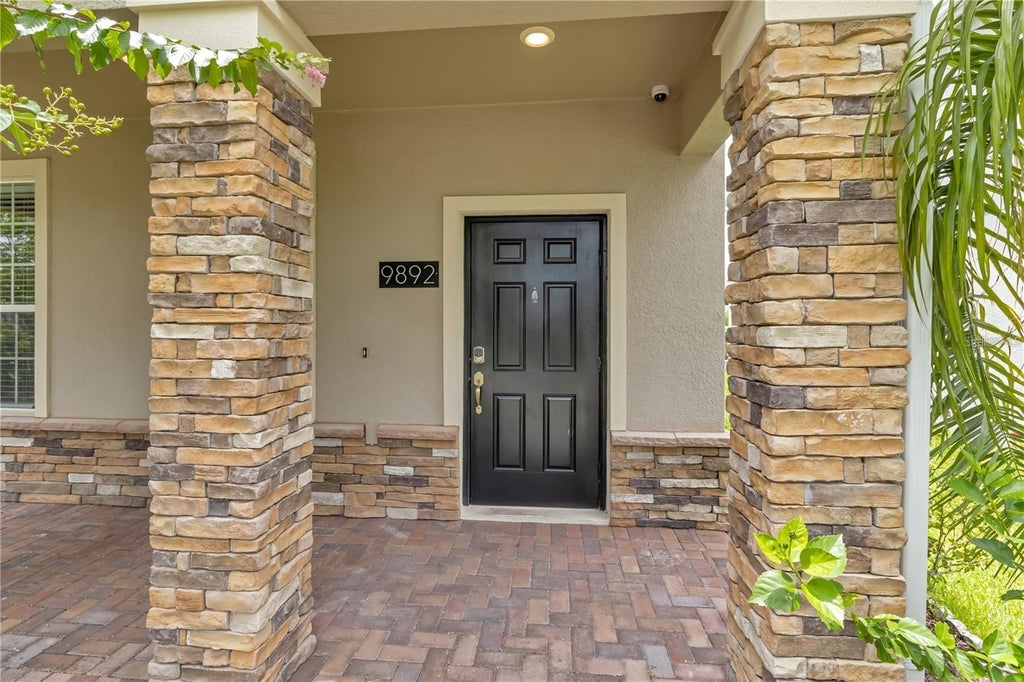 Photo of 9892 Pecan Hickory Way, Orlando, FL 32832 (MLS # O6415443)