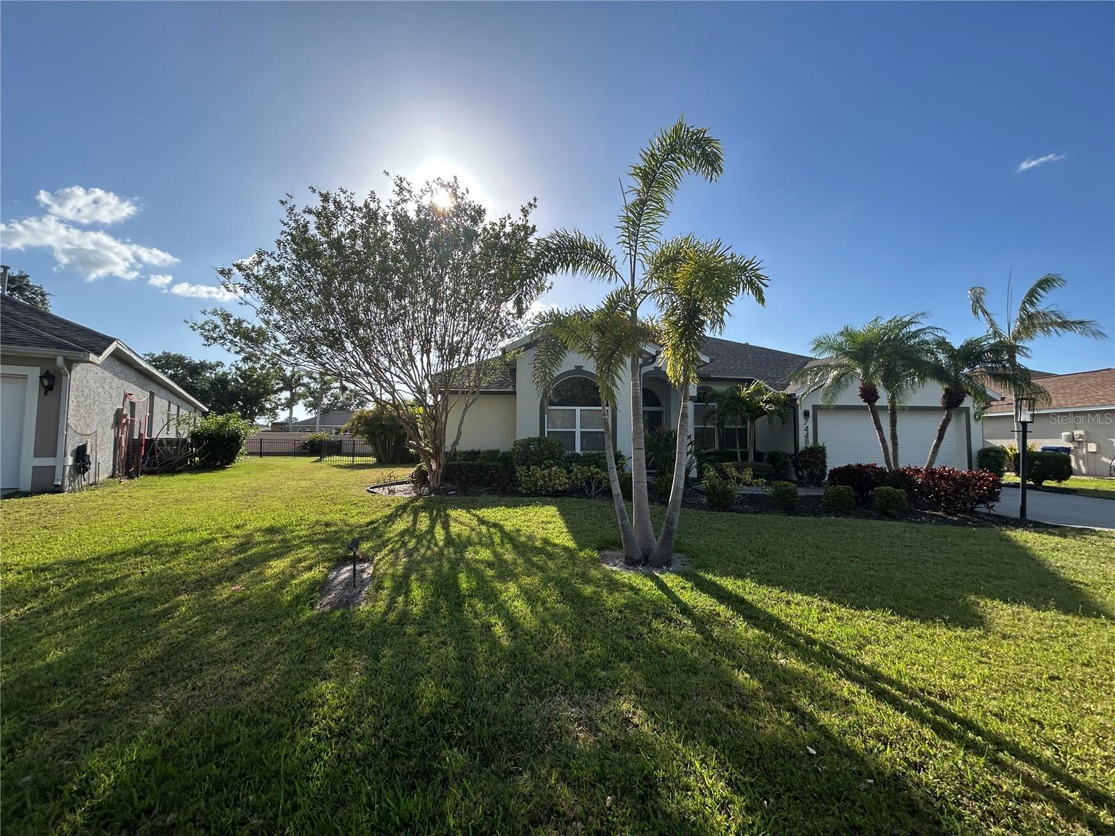 FULLY REMODELED turnkey furnished pool home. This home will not disappoint you with all new Engineered hardwood flooring through out the living areas and bedrooms. This open 4 bedroom split plan with 3 full all new bathrooms is a delight. A wonderful bright den in the front of the house with doors for privacy. The open bright kitchen is the main focal point with all white cabinets galore, light colored granite, dry bar or coffee bar is everyone's dream area. The kitchen views into the family room and nice views of the pool through the aquarium glass at the eat in breakfast nook. The house does a a fully fenced in yard for pool privacy. The huge screened in lanai area does have a heated pool, built in grill counter with sink for outdoor leisure for gatherings. The covered area on the lanai is oversized with electric roll down fabric screens for sun protection. The location of this home is on a quite cul-de-sac and close to all your everyday needs, Publix shopping plaza, SRQ airport, Super Walmart, Super Target, UTC Mall, 32 restaurants, University Parkway corridor and 15 min to downtown Sarasota. This property is available for the 2026 prime season at $7000 a month.