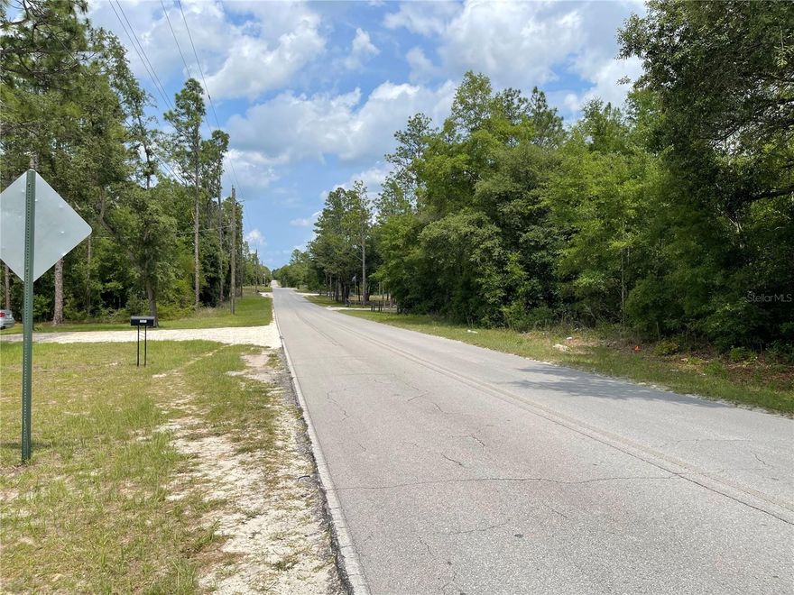 1.25 acres on a paved road in Bronson! Bring your builder or bring your new mobile home here. Already cleared and ready. Area of homes and mobile homes. 160 feet of road frontage.