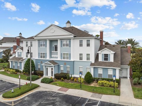 Photo of 7615 Heritage Crossing Way #201, Reunion, FL 34747 (MLS # O6319473)