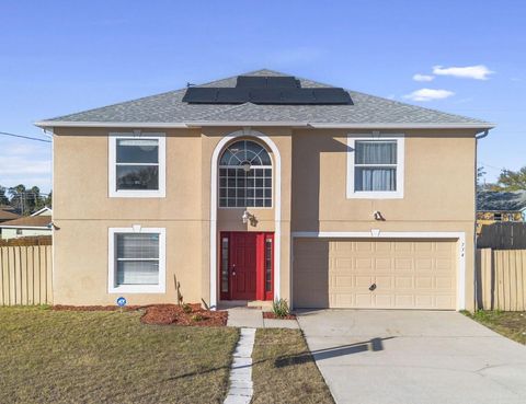 Photo of 734 Fruitland Drive, Deltona, FL 32725 (MLS # O6377036)