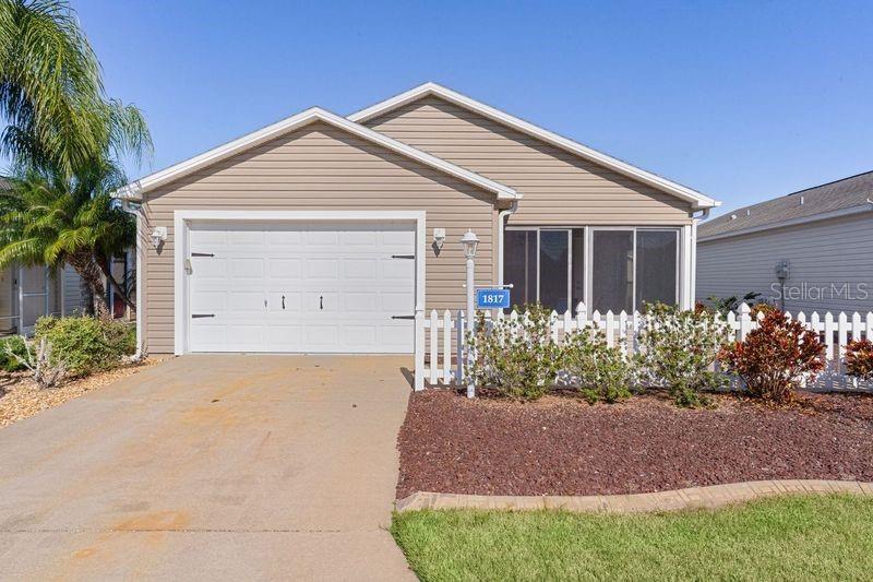 Located in a prime spot between Lake Sumter Landing and Brownwood Square, this charming Cabot Cove patio villa is a must-see! Immaculately maintained and full of natural light, this home offers comfort and convenience. Updates include a brand new roof (2023) a new hot water tank (2023), Pella sliding patio door with mini blinds, new A/C capacitor (2023), and a new garage door motor with remotes (2022). It also features a NOVA whole-house water filtration system, carbon monoxide/smoke detectors, garbage disposal, SECO whole-house surge protector, and a kitchen water osmosis filtration system. The home has beautiful ceramic tile flooring laid on the diagonal, plantation shutters, vaulted ceilings throughout, under-cabinet lighting in the kitchen, custom closets and pantry, ample storage space, a Murphy bed, built-in desk, and recessed lighting. The garage is equipped with built-in Gladiator cabinets, a garage door screen, and pull-down attic stairs for extra convenience and storage. The enclosed lanai has ceramic tile, and there are gutters, downspouts, and easy-to-care-for landscaping all around! This home truly stands out—priced to sell and ready for you to move in. The Villages has over 3,000 clubs, 107 Recreation Centers, 259 pickleball courts, 792 golf holes, 8 dog parks, 100 pools (all available to residents) and dozens of restaurants and stores. There is nightly entertainment at each square and this property is ideally located for easy access to all squares. Some furniture remains with the home - please see attachments. Schedule your private showing today!