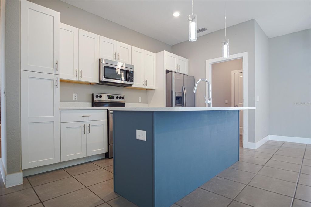 Photo of 210 Goldenrod Lane, Kissimmee, FL 34759 (MLS # S5149331)