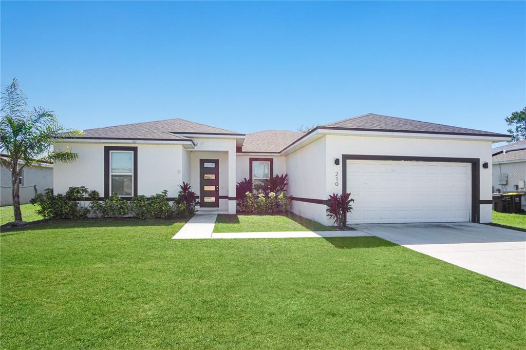 Photo of 210 Goldenrod Lane, Kissimmee, FL 34759 (MLS # S5149331)