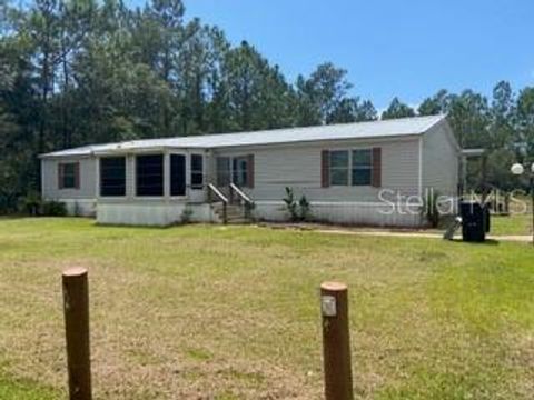 Photo of 1836 Hickory Street, Bunnell, FL 32110 (MLS # FC311357)