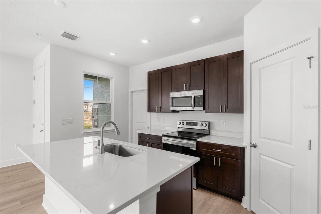 Photo of 1121 Orange Trailside Way, Ocoee, FL 34761 (MLS # W7887890)