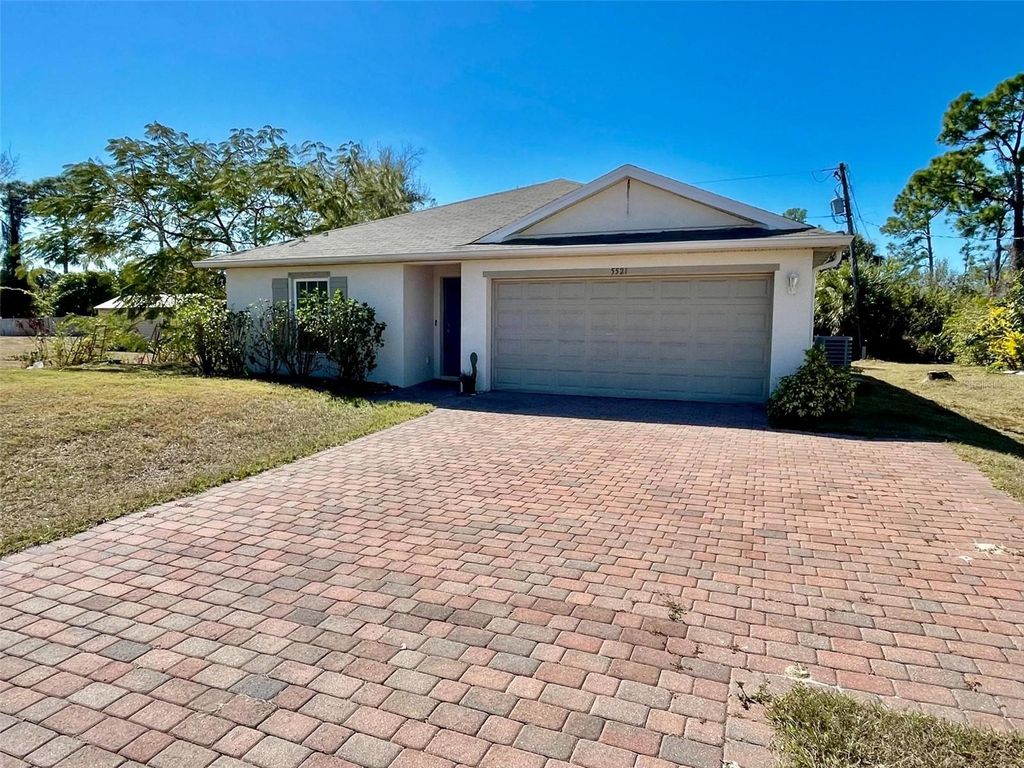 Photo of 5521 Gillot Boulevard, Port Charlotte, FL 33981 (MLS # A4681270)