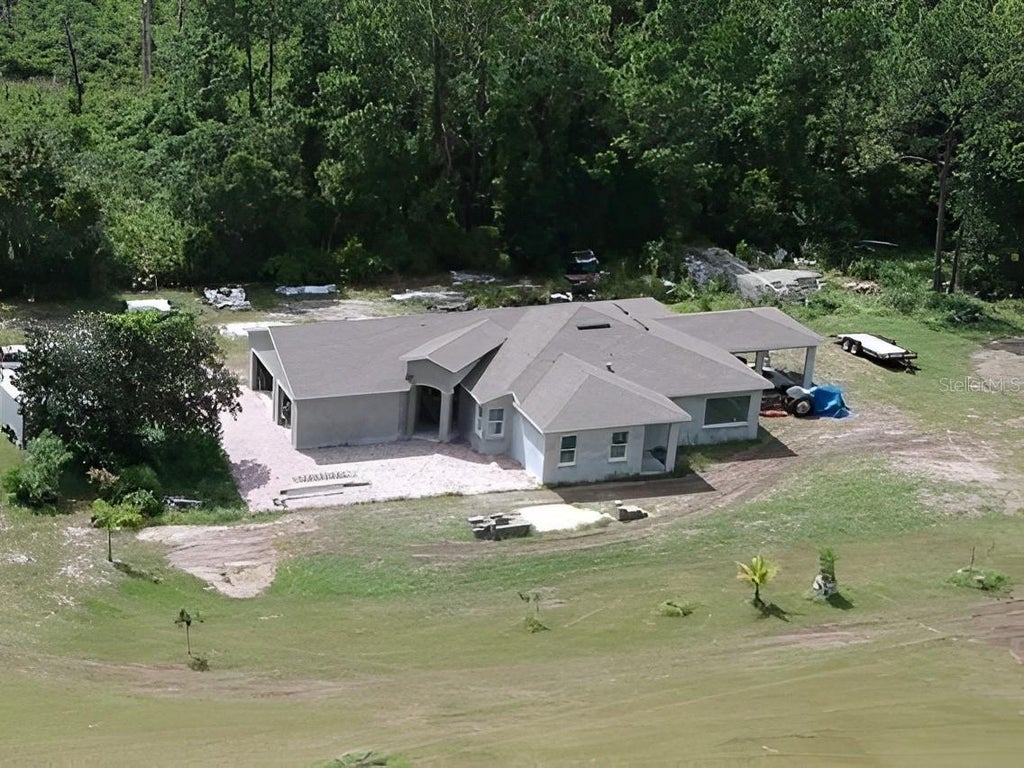 Photo of 6701 Old Melbourne Highway #A, Saint Cloud, FL 34771 (MLS # O6424620)