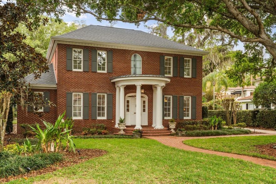 Set along a picturesque, tree-lined street in the heart of College Park, this stunning four-bedroom, three-and-one-half bath brick residence offers timeless elegance paired with modern upgrades and exceptional livability. From its charming curb appeal to its thoughtfully designed interior, this two-story home is a true standout.

Inside, beautiful wood floors flow throughout the main living areas, setting a warm and inviting tone. A dedicated office with French doors provides the perfect work-from-home retreat, while the formal living room—complete with custom built-ins and French doors—opens seamlessly to the outdoor entertaining space. A gracious formal dining room connects to the kitchen via a convenient butler’s pantry, ideal for hosting.

The open-concept kitchen and family room serve as the heart of the home. The kitchen is equipped with high-end appliances, including a Thermador 6-burner gas range and a Viking refrigerator, and overlooks the spacious family room, recently enhanced with a full wall of custom built-ins (2025).

The private first-floor primary suite is a serene retreat, featuring two sets of French doors that lead to the covered lanai and backyard oasis. The luxurious primary bath offers dual walk-in closets, separate vanities, a classic claw-foot tub, and a walk-in shower. A laundry room, powder bath, and a convenient drop zone from the garage complete the first level.

Upstairs, you’ll find three additional bedrooms—one with an ensuite bath—all featuring built-in closets. A cozy reading nook or media area adds flexible living space, while an impressive 15' x 11' climate-controlled storage room provides rare and valuable extra storage.

Step outside to enjoy your private backyard retreat, complete with a sparkling saltwater pool, a newly installed putting green with turf (2022), and a new pool pump (2024)—perfect for both relaxing and entertaining. Additional highlights include a two-car attached garage, expanded driveway parking, and a roof replaced in 2021.

Ideally located just moments from the charming shops and restaurants of Edgewater Drive in picturesque College Park, this home also offers convenient access to downtown Orlando, area hospitals, and major sports venues. Enjoy proximity to the historic Country Club of Orlando, along with easy access to major roadways for seamless commutes to Orlando International Airport, Orlando Executive Airport, and world-renowned theme park attractions.

This exceptional home blends classic charm with modern convenience in one of College Park’s most desirable locations. Please refer to MLS attachments for a complete list of upgrades and improvements.