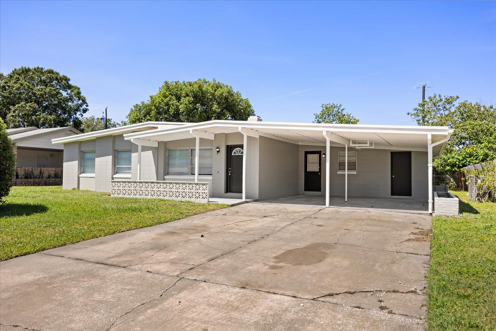 Nestled near the highly sought-after Winter Park area, this beautifully updated 4-bedroom, 2-bath concrete block home has been recently renovated and features new appliances, stunning waterfall countertops, all-new bathrooms, fresh interior and exterior paint, brand-new flooring, granite countertops, a stylish backsplash, and updated plumbing throughout. Enjoy the spacious backyard, a 2-car carport, and the freedom of NO HOA—offering the perfect blend of comfort, convenience, and value!