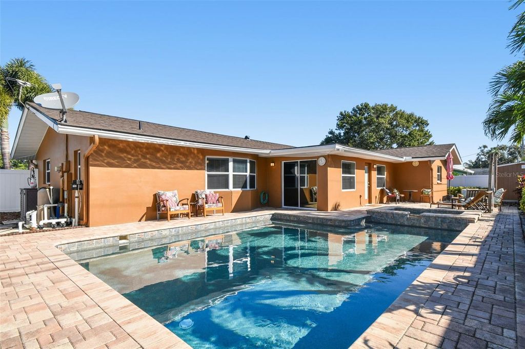 Photo of 13948 Brewster Drive, Largo, FL 33774 (MLS # TB8451951)