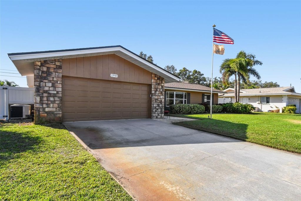 Photo of 13948 Brewster Drive, Largo, FL 33774 (MLS # TB8451951)