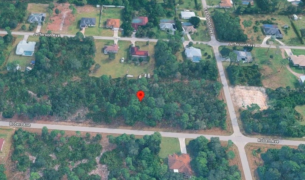 Photo of 904 Robert Avenue, Lehigh Acres, FL 33936 (MLS # O6384369)