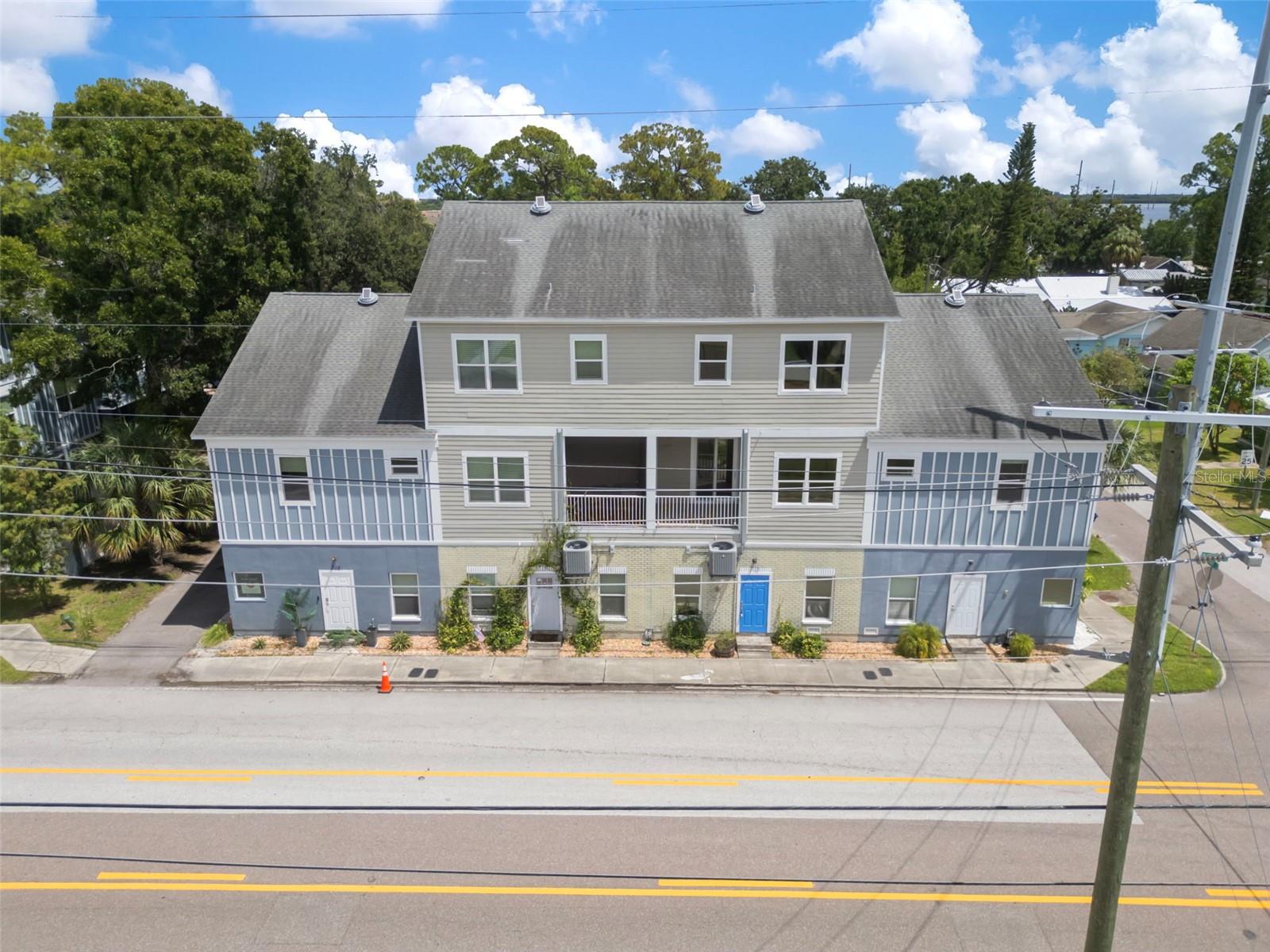 Nestled in the desirable Palmetto Beach enclave mere minutes from SPARKMAN WHARF, Channelside, and historic Ybor City, this meticulously maintained, 2016-built townhome spans approximately 2,200 sqft across three stories. Boasting 3 bedrooms and 2.5 baths, the layout features a versatile first-floor bonus room ideal for an office, gym, or media space, followed by a stylish open-concept second floor combining living, dining, and kitchen areas with stainless steel appliances, butcher block countertops, a farmhouse sink, and access to a private balcony. The expansive primary suite offers a walk-in closet and luxurious bath with dual vanity, Jacuzzi tub, and separate shower, while two additional upstairs bedrooms ensure privacy. Practical comforts include laminate and tile flooring, a laundry closet, and an oversized attached two-car garage. All this is available with a low $55 monthly HOA, combining city-center convenience with peaceful residential charm.