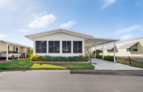 Photo of 12501 Ulmerton Road #135, Largo, FL 33774 (MLS # TB8557685)