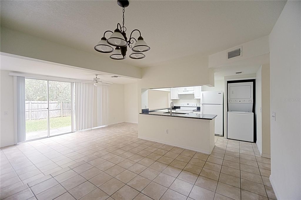 Photo of 821 Orchid Drive #A, Davenport, FL 33897 (MLS # S5143344)
