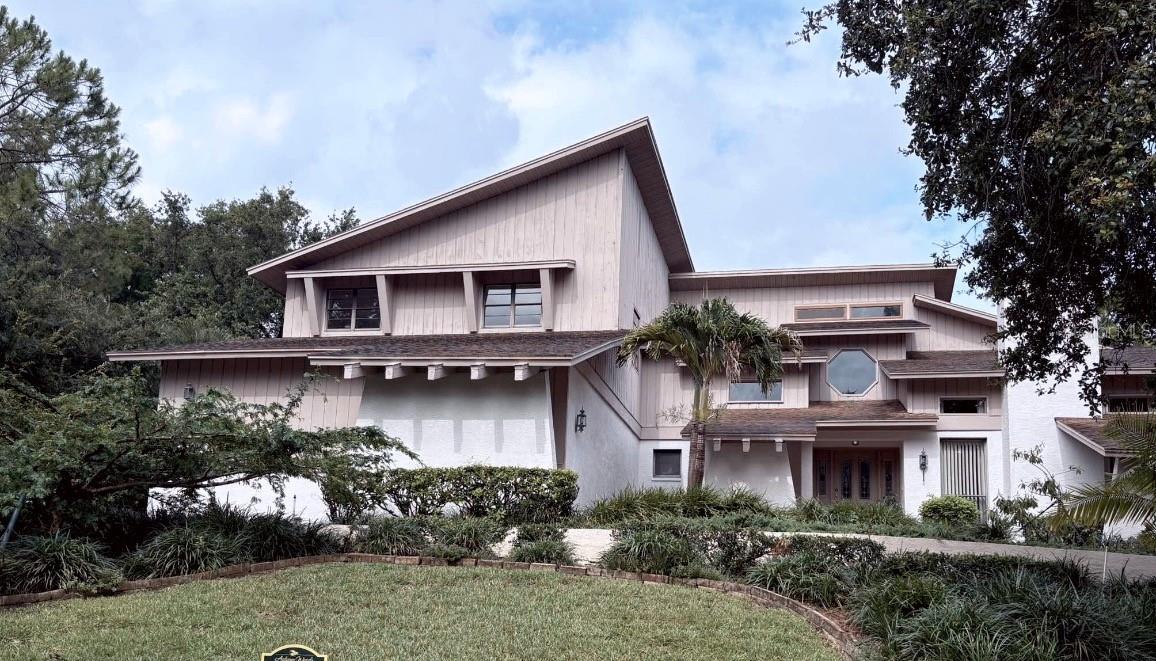 Welcome to this stunning 5-bedroom, 4-bath family home located in a well-maintained deeded community in Palm Harbor. This beautifully maintained property offers modern amenities and elegant features that makes it perfect for you and your family . Upon entering, you'll be greeted by a spacious formal living room with a wood fireplace and luxurious drapes, leading to a library/bedroom with a full bathroom. The cozy family room is perfect for gatherings and relaxation, featuring a fireplace, wet bar, breakfast counter, and a spiral staircase going to the 2nd-floor loft with closets. The kitchen is equipped with top-of-the-line appliances, ideal for cooking and entertaining, with a space for a eat-in table overlooking the garden and pool area. The formal dining room offers a picturesque view, making it perfect for hosting dinners. The property boasts multiple spacious bedrooms and bathrooms, each with cabinetry, providing ample storage and a touch of elegance. The 2nd-floor expanded hallway includes a bookcase, desk area, walk-in closet, and closet, adding to the home's functionality. For efficient cooling, the home is equipped with two Lennox A/C systems. The laundry room offers additional storage, a washer, dryer, sink, and a laundry-chute, adding convenience to your daily routine. The property also includes hurricane-marked wood panels for added window protection. Enjoy outdoor living with a covered lanai and a sparkling pool, perfect for leisure and activities. The large garage provides ample parking and storage space. Various flooring types throughout the house enhance its aesthetic appeal. Meticulously detailed maintenance schedules for roofing and appliances ensure the property remains in top condition. Over the years, specific renovations and upgrades reflect the continuous improvement and care given to this home.
Located close to Dunedin Beach/Honeymoon Island, restaurants, grocery stores, Historic Tarpon Springs, and both Tampa and St. Pete Clearwater Airports, this property offers unparalleled convenience. Don't miss the opportunity to make this stunning home yours!