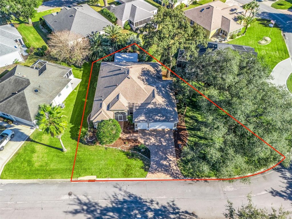 Photo of 707 Cimarron Avenue, Lady Lake, FL 32159 (MLS # G5106178)