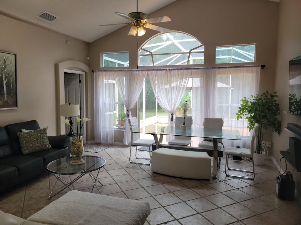 Photo of 13706 Riverpath Grove Drive, Orlando, FL 32826 (MLS # O6443523)