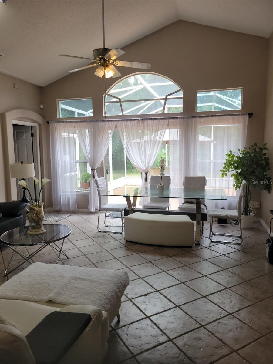 Photo of 13706 Riverpath Grove Drive, Orlando, FL 32826 (MLS # O6443523)