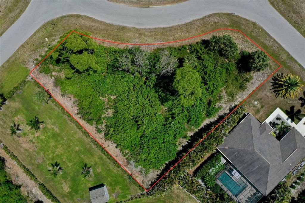 Photo of 125 Australian Drive, Rotonda West, FL 33947 (MLS # C7525612)