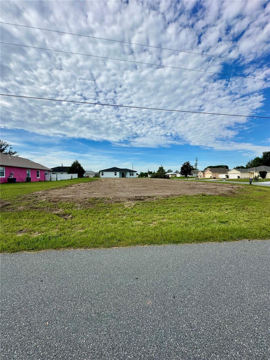 Discover the perfect spot to bring your vision to life with this spacious 0.3-acre residential lot located in the heart of Marion Oaks in Ocala! This oversized corner parcel is already cleared, saving you time and money as you prepare to build your dream home or invest in one of Central Florida’s fastest-growing communities. Situated on a quiet, well-maintained street, this property offers very easy access to SR 484 and the new SW 49th Court Rd. Brand new schools, shopping, and dining are all a short drive away, while still providing the peace and privacy of a suburban setting. With R1 residential zoning, this lot is ideal for a single-family home with plenty of room for a yard, garden, or additional outdoor space. This lot has a Standard Public Water connection and will need to be developed with a septic system. No HOA, No Flood Zone, and no time limit to build—just a great opportunity in a thriving area.