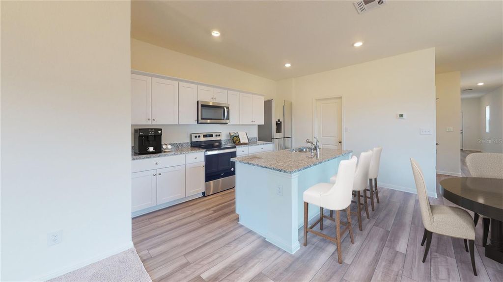 Photo of 10484 Curving Creek Loop, Parrish, FL 34219 (MLS # TB8508968)