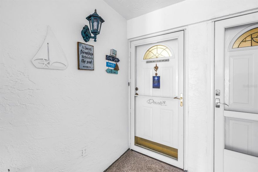 Welcome home to one of the rarest finds in all of Penthouse Groves - a true 3-bedroom, 2-bath CORNER UNIT on the first floor, boasting sweeping pond water views and NOT IN A FLOOD ZONE. At 1,600 square feet, this is one of the largest units in the community and one of very few offering a full third bedroom, making it an exceptional value compared to anything else available today.
 
Step inside to discover luxury vinyl flooring throughout, soaring open-concept living and dining areas framed by serene pond views that greet you the moment you walk in. The beautifully updated kitchen is a true showpiece - featuring custom solid wood cabinets, Corian countertops, a glass tile backsplash, stainless steel appliances, a closet pantry, and a breathtaking custom shiplap ceiling with recessed crown molding lighting you won't find anywhere else in this community.
 
The oversized primary suite is designed for comfort with his and hers walk-in closets and a fully updated private bath. The second bedroom accommodates a king-size bed with ease, and ALL THREE bedrooms enjoy their own private patio access via sliding glass doors - perfect for enjoying those beautiful Florida mornings and evenings. Both bathrooms have been tastefully updated throughout.
 
Your assigned covered carport is just steps from your front door, and with ground-level entry and a corner location, this unit offers unmatched convenience and natural light from multiple exposures.
 
Penthouse Groves is an active and vibrant 55+ community featuring a magnificent clubhouse with full kitchen, billiard room, library, card room, fitness center, sauna, shuffleboard courts, a community fishing dock overlooking the pond, and a gorgeous pool with lounge seating and a grilling area. The monthly HOA fee of $624 covers cable TV, water, sewer, trash, pest control, exterior maintenance, grounds, pool, insurance, and recreational facilities - true lock-and-leave living at its finest.
 
Ideally positioned in mid-county Clearwater - just 5 blocks to Publix and shopping, 15 minutes to the world-famous Gulf beaches, and 30 minutes to Tampa International Airport. Units of this size, floor plan, and condition in Building J are exceptionally rare. Don't let this one slip away!
