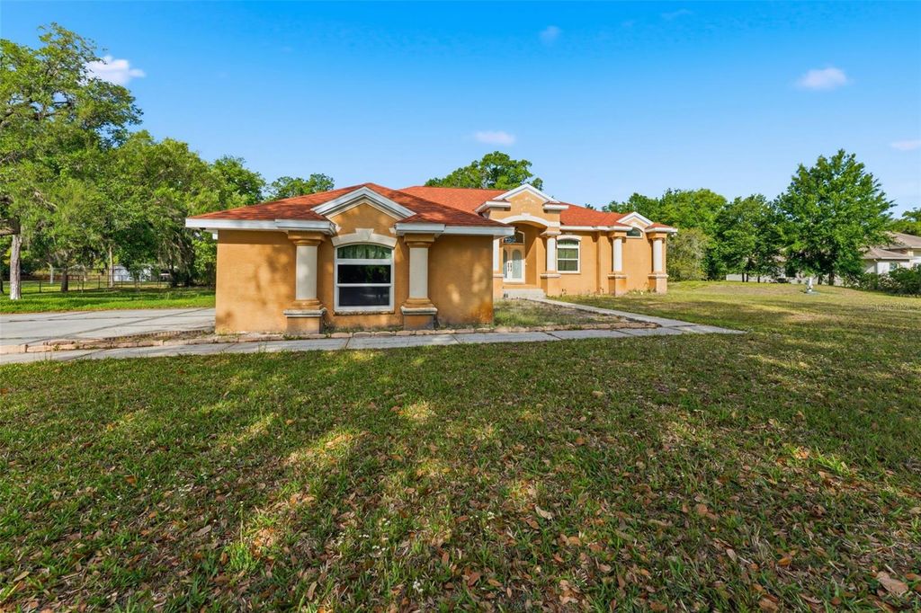 Photo of 6343 Country Club Road, Wesley Chapel, FL 33544 (MLS # TB8494391)