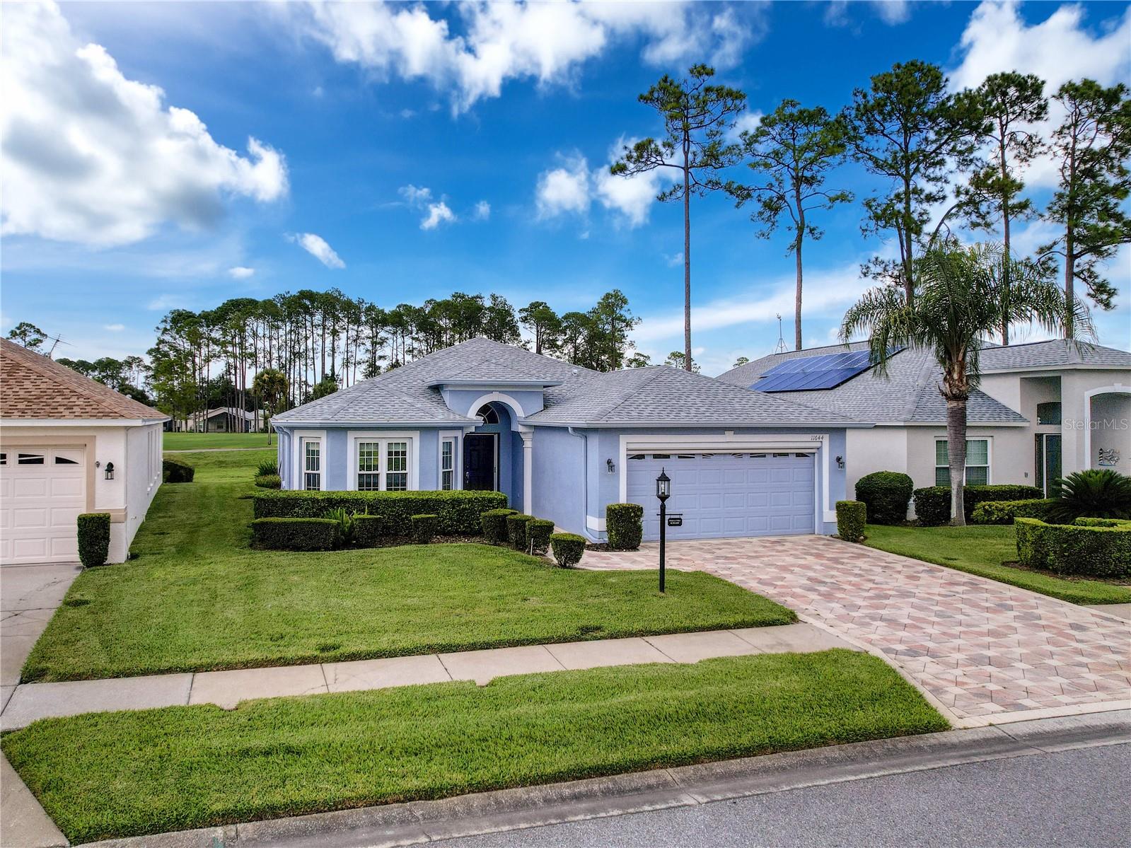 RARE FIND! 3 BEDROOMS | 2 Bath | 2-Car Garage | Versatile Florida Room with Golf Course and Conservation Views!
Don’t miss this exceptional opportunity to own a beautifully upgraded 3-bedroom, 2-bath home with a spacious 2-car garage and a massive Florida room (12X20 heated/cooled) overlooking the 11th hole—perfect for morning coffee, kicking back with a book, hosting guests or sunset relaxation.
This MOVE-IN READY home features recent major updates (OVER $30,000) including a 2024 ROOF and HVAC system, newer hot water heater, new refrigerator, and new washer and dryer. The interior shines with new double-pane windows, new wood laminate flooring in the great room, and thoughtful upgrades like Phantom Screens at both the front entry and garage, Hunter Douglas block-out shades, and high-rise commodes. The primary suite includes an updated walk-in shower that feels reminiscent of a rainforest spa, while the home also features an in-wall pest control system, water softener and filtration system with reverse osmosis to the refrigerator, and gutters for added protection. X Flood Zone!
Located in the sought-after Heritage Pines Community, this home offers completely maintenance-free living within an active 55+ gated community. Nestled along Florida’s scenic Nature Coast, Heritage Pines is just 45 minutes north of Tampa International Airport and is known for its peaceful, serene setting rich with natural beauty. The community is proud to be named a “Neighborhood for Nature” by Audubon International, offering a lifestyle surrounded by lush greenery and vibrant wildlife.
Heritage Pines is a secure and financially sound community of 1,406 homes, featuring a private, resident-owned golf course, a spectacular clubhouse, and a full calendar of events and activities. Whether you're into golf, fitness, social clubs, or simply enjoying the tranquil surroundings, there’s something here for everyone.
This is truly a rare gem in one of Florida’s most desirable 55+ resort-style communities - The Florida Life Awaits!