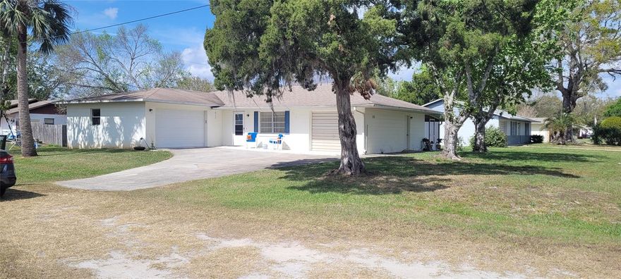 Bright, spacious and well maintained 2 bedroom, 2 bath concrete block home on corner lot. This adorable home features 2 separate 1 car garages, 18 x 9 glass enclosed florida room, separate screened patio, bonus room perfect for office or even 3rd bedroom. Roof on house approx 6 years old, ac unit approx 2020, outside shed. All information in MLS deemed accurate but cannot be guaranteed and is to be verified by buyer and or agent, ;Water: City