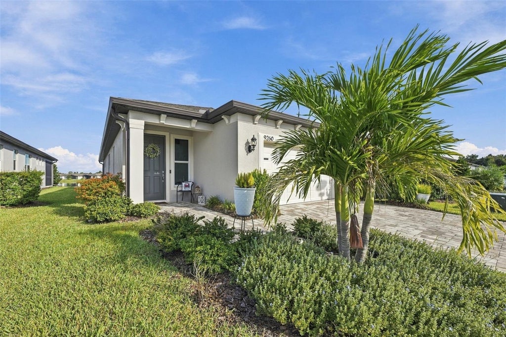 Photo of 9260 Ballaster Pointe Loop, Parrish, FL 34219 (MLS # O6446445)