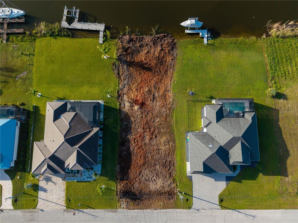 Photo of 16632 Liggett Cir, Port Charlotte, FL 33981 (MLS # A4667290)