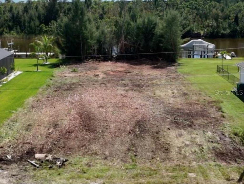 Photo of 16632 Liggett Cir, Port Charlotte, FL 33981 (MLS # A4667290)