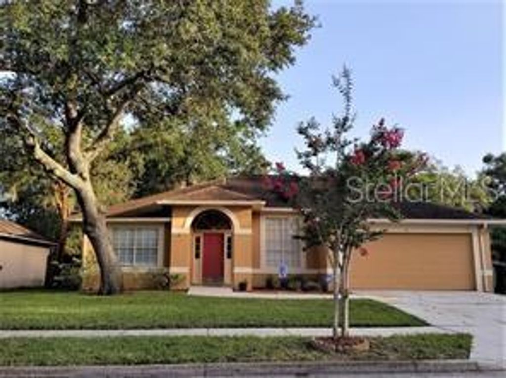 Photo of 5124 Clarion Hammock Drive, Orlando, FL 32808 (MLS # O6382419)